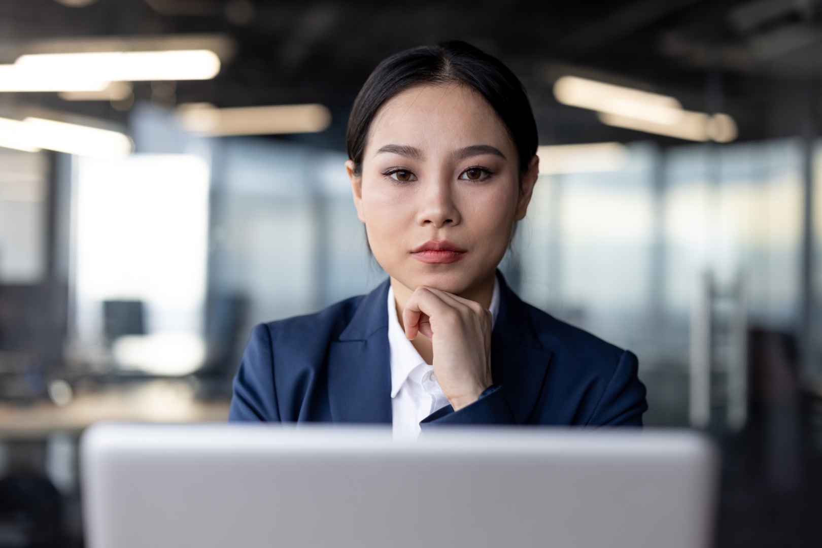confident-asian-businesswoman-in-formal-suit-worki-2024-08-21-16-44-44-utc